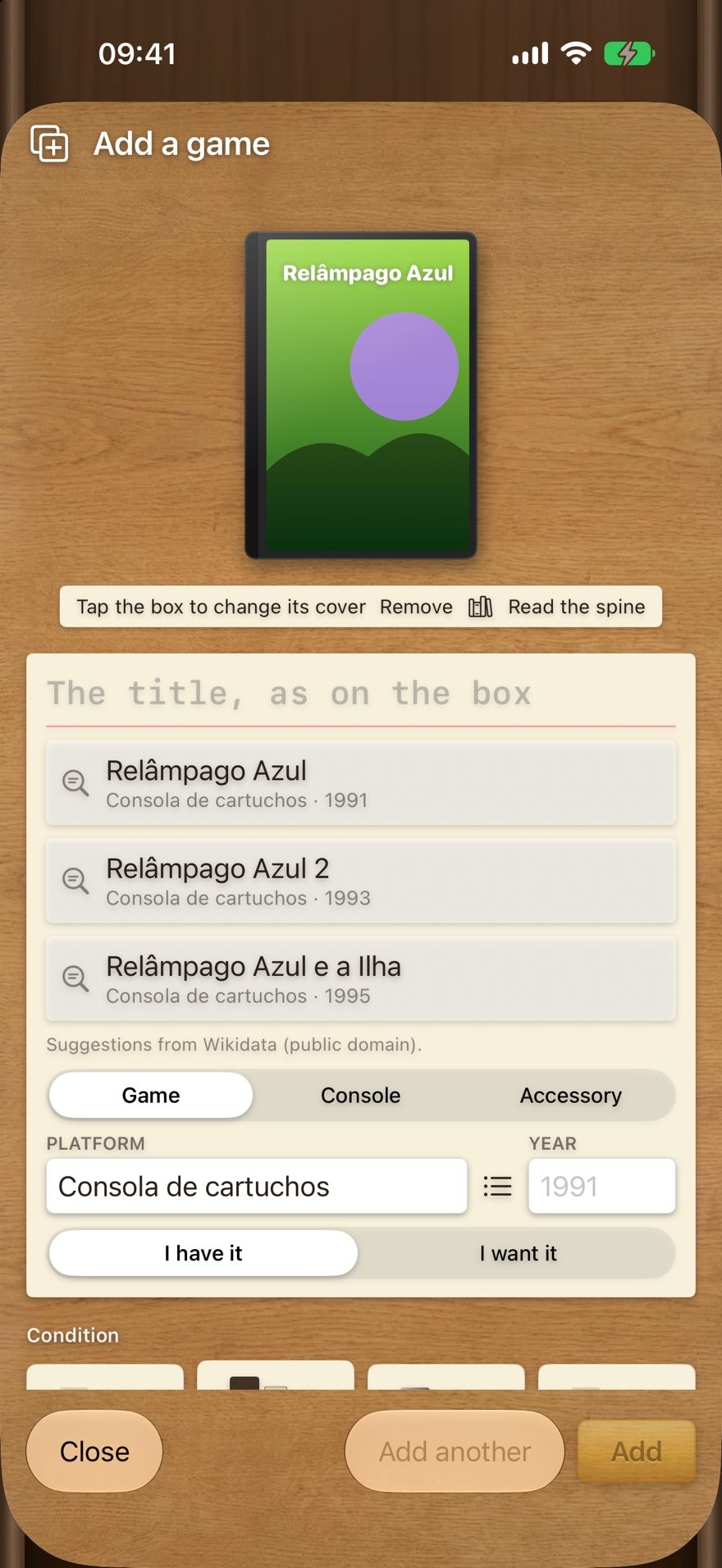 Adding a game in Collectors Den: a photographed box, three title suggestions with platform and year, and choices for game, console or accessory.