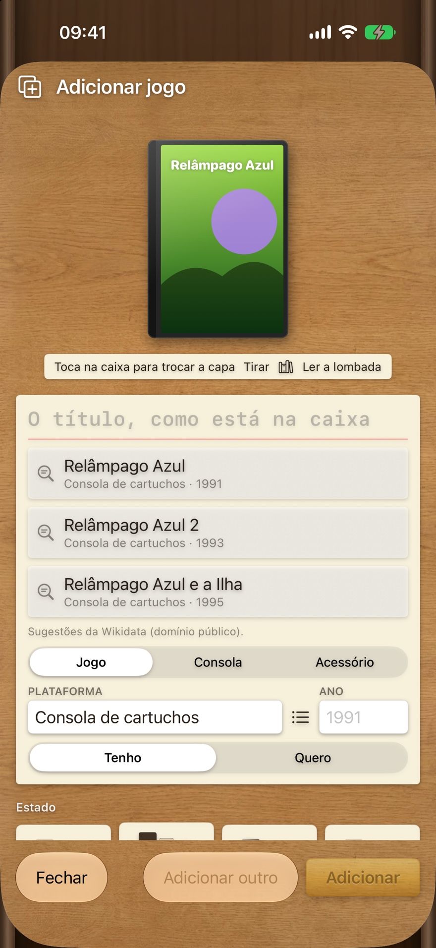 Adicionar um jogo: a caixa fotografada em cima, três sugestões de título por baixo, e a escolha entre jogo, consola ou acessório.