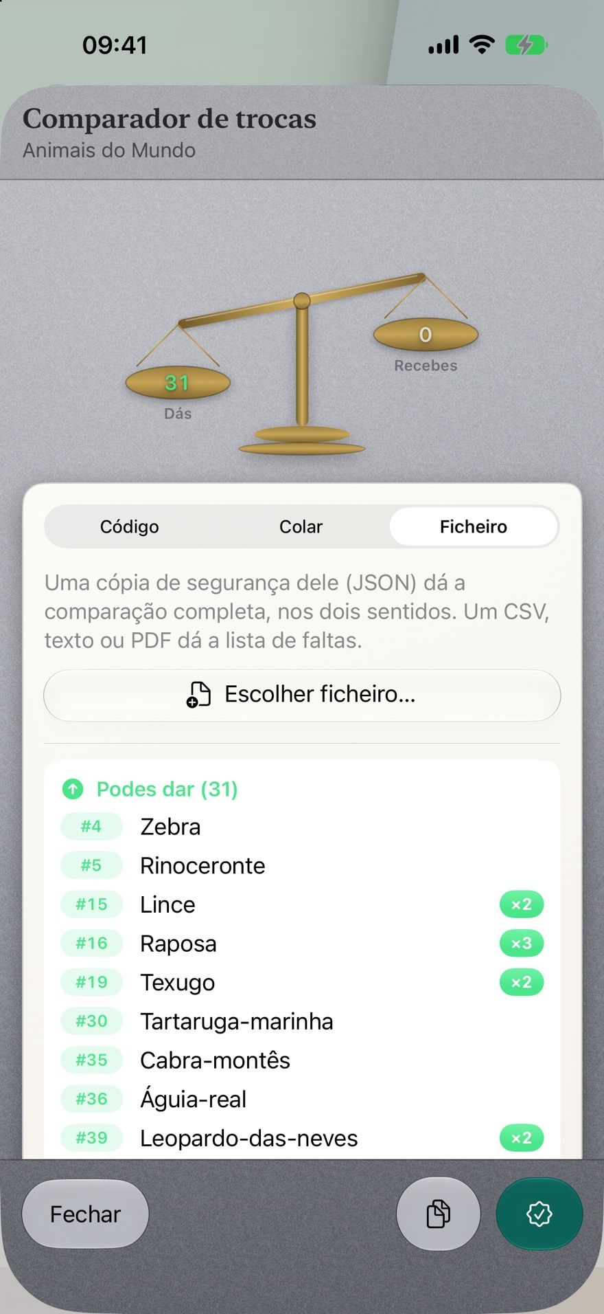 O comparador de trocas: uma balança de latão com 31 cromos para dar e 0 para receber, sobre uma lista de repetidos numerados.